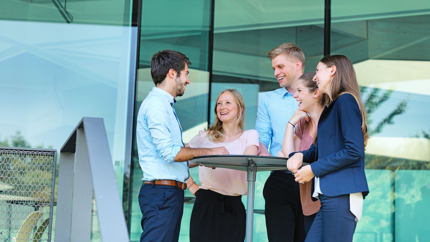 A group of students at TRUMPF are talking