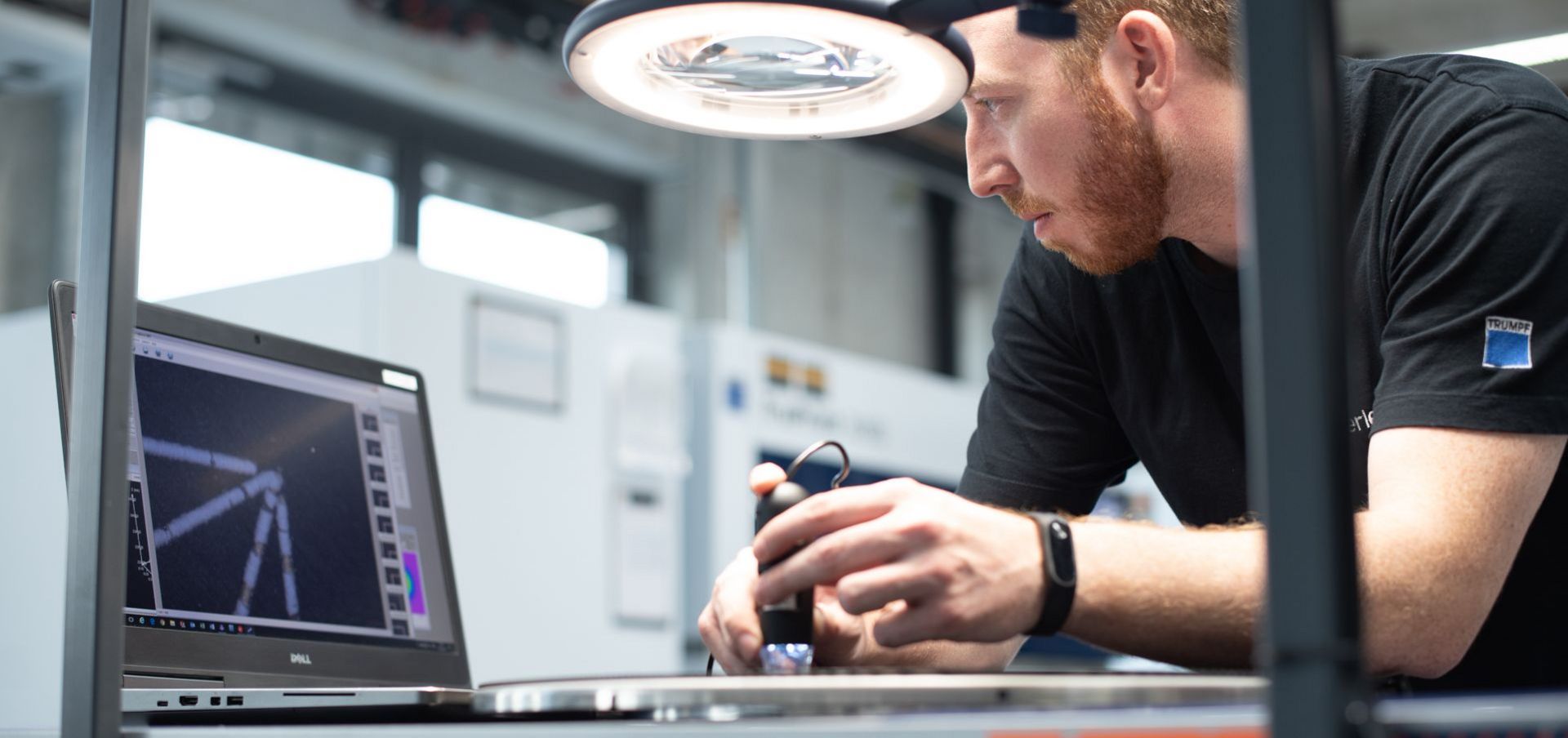 TRUMPF employee checking component for aerospace industry