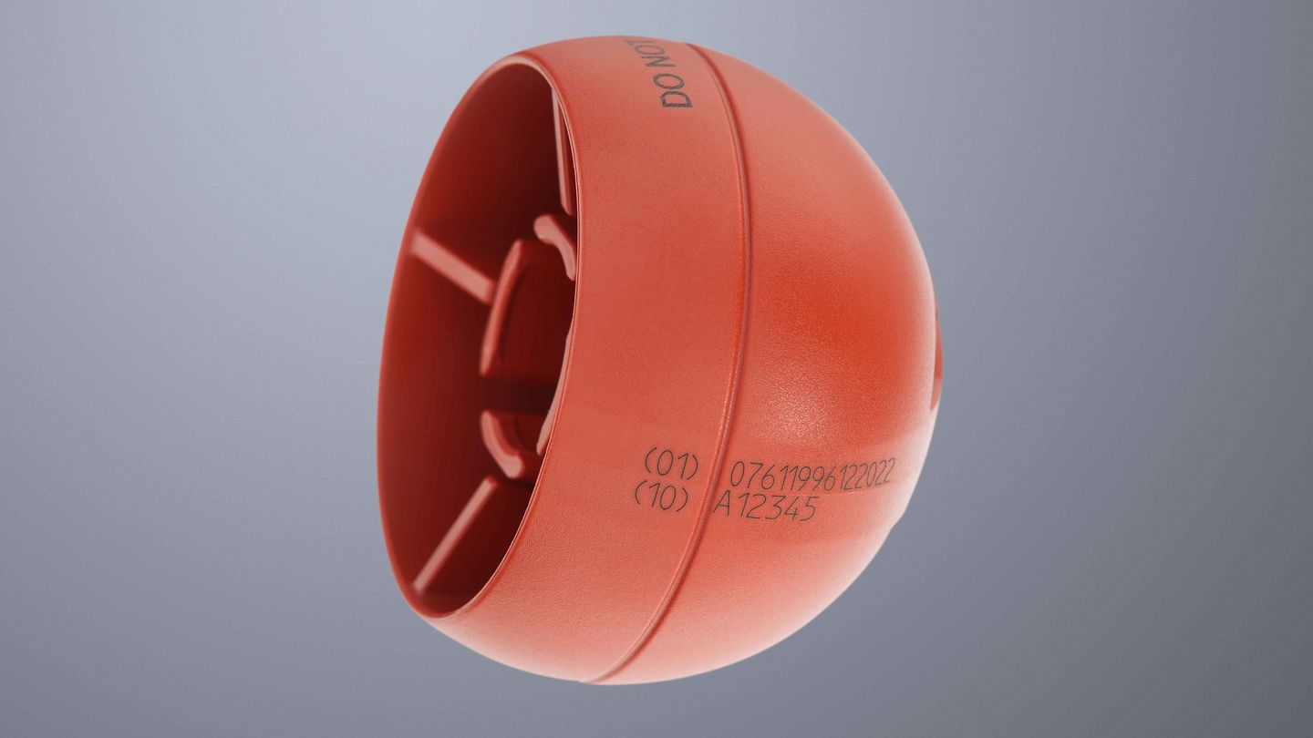 Laser-marked test ball joint of a hip implant