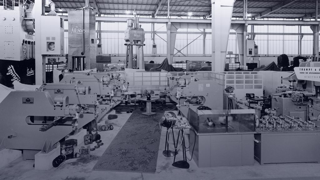 historical picture of a booth of TRUMPF at a trade show in Hanover Germany