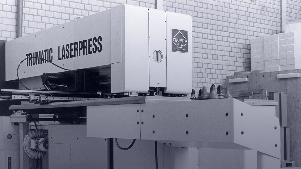 historical picture showing a combined punching and laser-cutting machine of TRUMPF