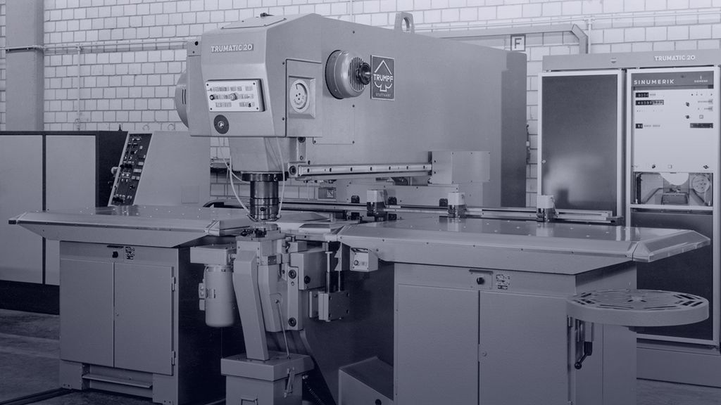historical picture of the first sheet metal fabrication machine with a numerical control system from TRUMPF