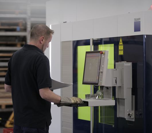 Personnel operating a machine