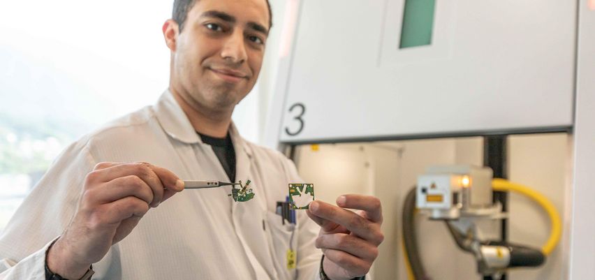 Man with sample part in front of the TruMark 3330